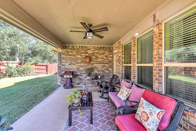 view of patio featuring an outdoor hangout area, a ceiling fan, and grilling area