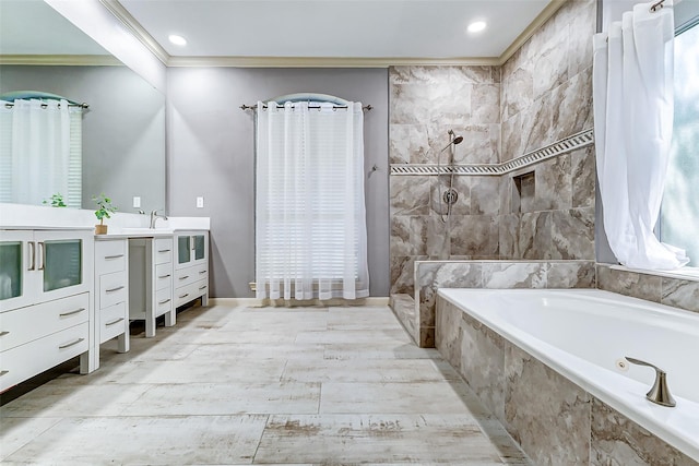 bathroom with vanity, recessed lighting, crown molding, tiled shower, and a bath