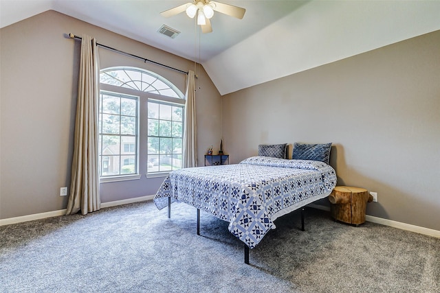 bedroom with carpet, visible vents, baseboards, and vaulted ceiling