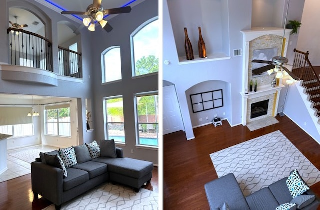 11603 Shoal Landing St, Pearland, TX 77584 - living room featuring ceiling fan, a fireplace with flush hearth, wood finished floors, a high ceiling, and a chandelier