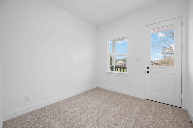 interior space featuring baseboards