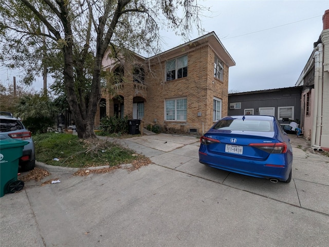 706 66th St Unit 2, Houston, TX 77011 - view of front of house featuring crawl space and brick siding