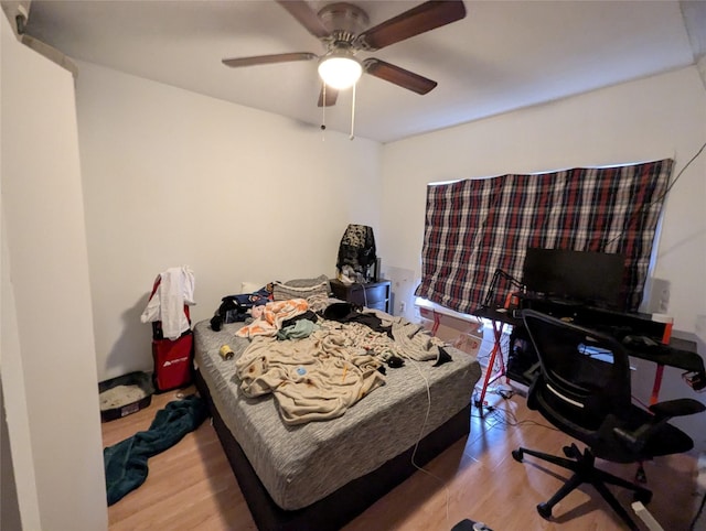 706 66th St Unit 2, Houston, TX 77011 - bedroom with ceiling fan and wood finished floors