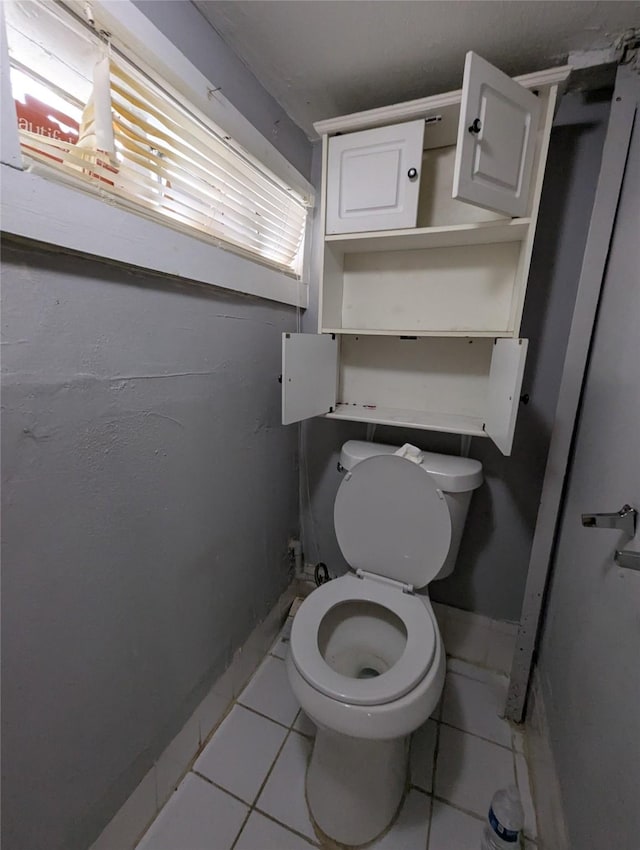 706 66th St Unit 2, Houston, TX 77011 - bathroom with toilet and tile patterned floors