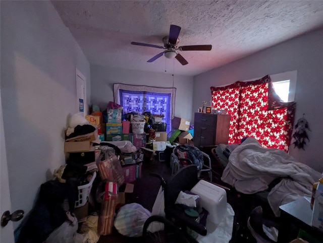 706 66th St Unit 2, Houston, TX 77011 - bedroom with a ceiling fan and a textured ceiling