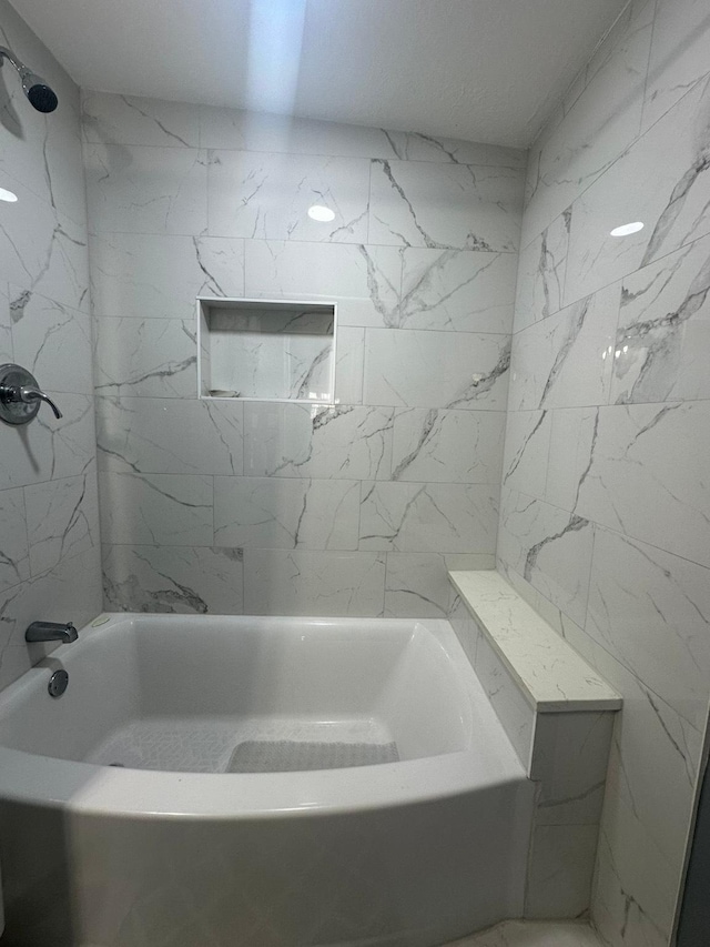 full bathroom with shower / bathtub combination