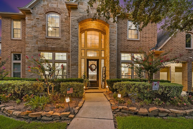 view of front of house featuring stone siding