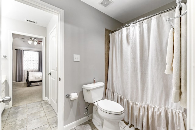 bathroom featuring toilet, visible vents, ceiling fan, and tile patterned flooring