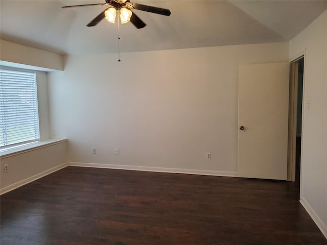 13002 Nantucket Dr, Sugar Land, TX 77478 - empty room with dark wood finished floors, baseboards, and ceiling fan