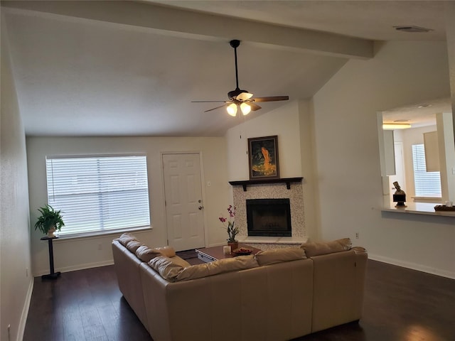 13002 Nantucket Dr, Sugar Land, TX 77478 - living area with a ceiling fan, vaulted ceiling with beams, a fireplace, baseboards, and dark wood-type flooring
