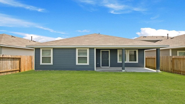 23640 Silver Concord Dr, Splendora, TX 77372 - back of property with a patio area and a shingled roof