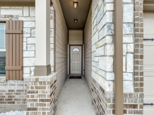 13088 Laura Lake Dr, Willis, TX 77318 - view of exterior entry with stone siding