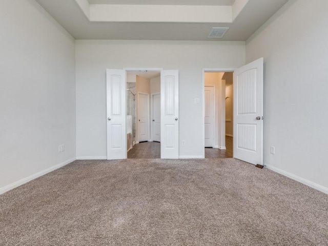 13088 Laura Lake Dr, Willis, TX 77318 - unfurnished bedroom with visible vents, baseboards, and carpet floors