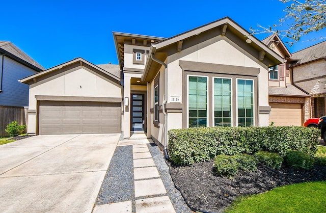 11115 Elderflower Dr, Missouri City, TX 77459 - view of front of property with stucco siding, a garage, and driveway