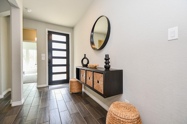 11115 Elderflower Dr, Missouri City, TX 77459 - entryway with baseboards and wood finish floors
