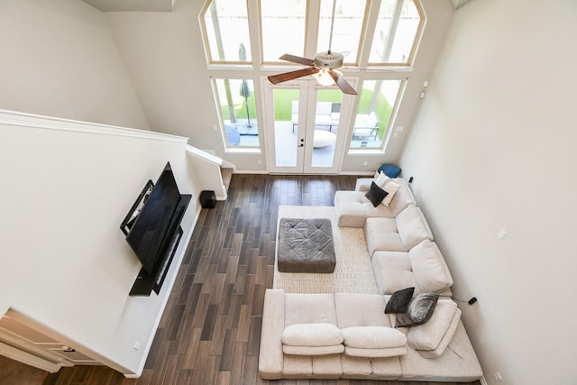 11115 Elderflower Dr, Missouri City, TX 77459 - living area with plenty of natural light, dark wood-style flooring, ceiling fan, and baseboards