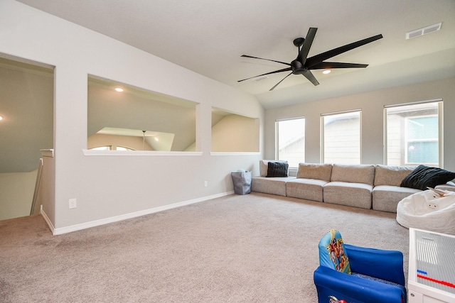 11115 Elderflower Dr, Missouri City, TX 77459 - carpeted living room featuring a ceiling fan, lofted ceiling, and baseboards