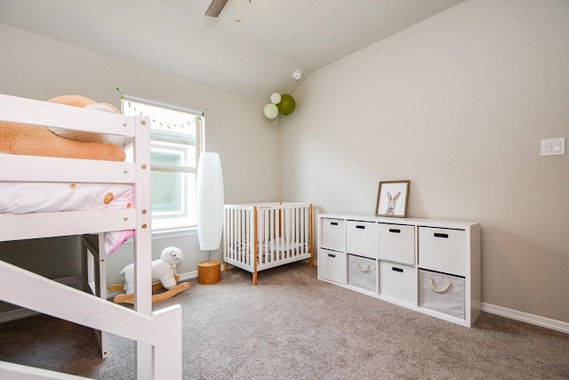 11115 Elderflower Dr, Missouri City, TX 77459 - bedroom featuring carpet floors, lofted ceiling, a nursery area, baseboards, and ceiling fan