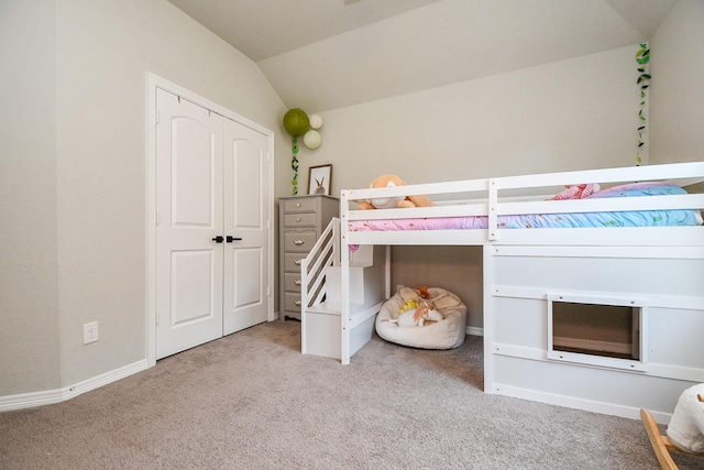 11115 Elderflower Dr, Missouri City, TX 77459 - bedroom with carpet floors, vaulted ceiling, a closet, and baseboards