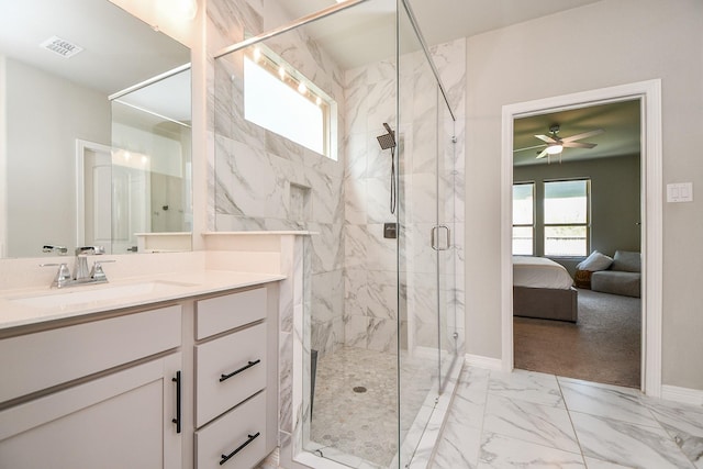 11115 Elderflower Dr, Missouri City, TX 77459 - ensuite bathroom with marble finish flooring, a ceiling fan, a marble finish shower, vanity, and baseboards