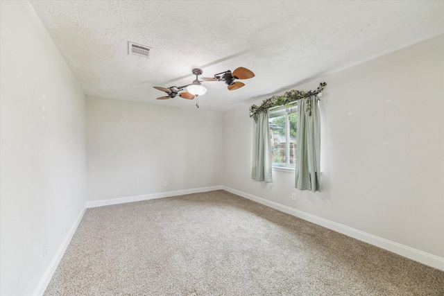 4010 Bluebonnet Trl, Deer Park, TX 77536 - carpeted empty room featuring a ceiling fan and a textured ceiling