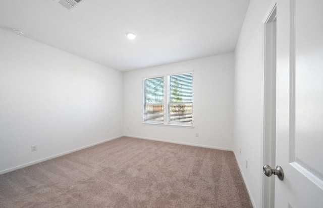 10710 Sora Dr, Willis, TX 77378 - empty room with light carpet and baseboards