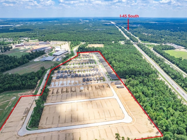 10710 Sora Dr, Willis, TX 77378 - view of property location featuring property parcel outlined and a heavily wooded area