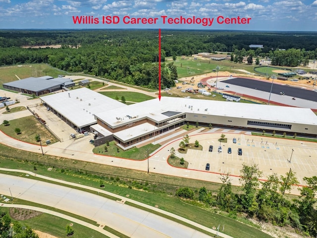 10710 Sora Dr, Willis, TX 77378 - drone / aerial view of a forest