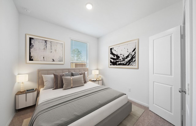 10710 Sora Dr, Willis, TX 77378 - bedroom with carpet flooring and baseboards