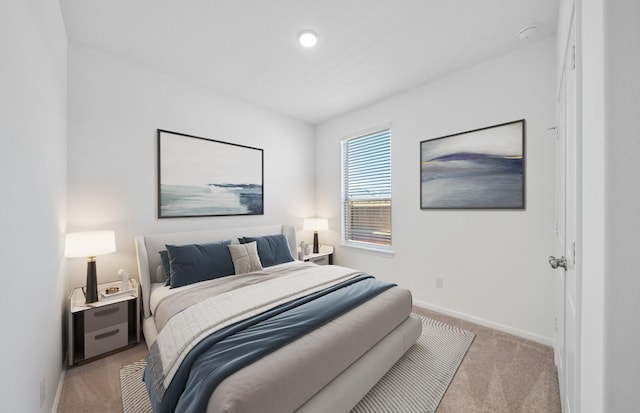 10710 Sora Dr, Willis, TX 77378 - bedroom featuring light colored carpet and baseboards