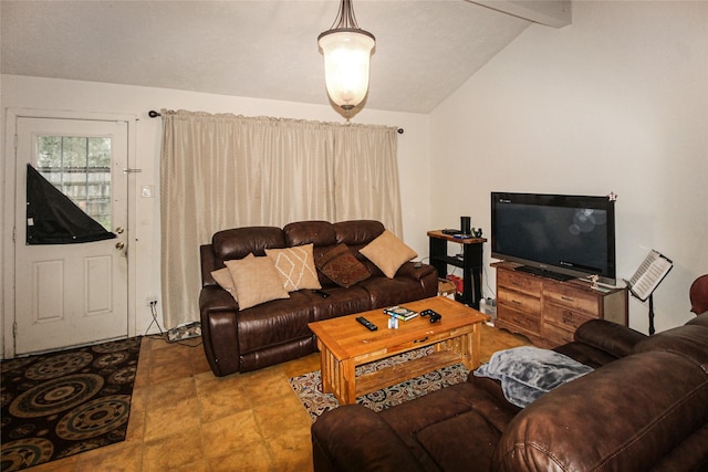 living area with lofted ceiling with beams