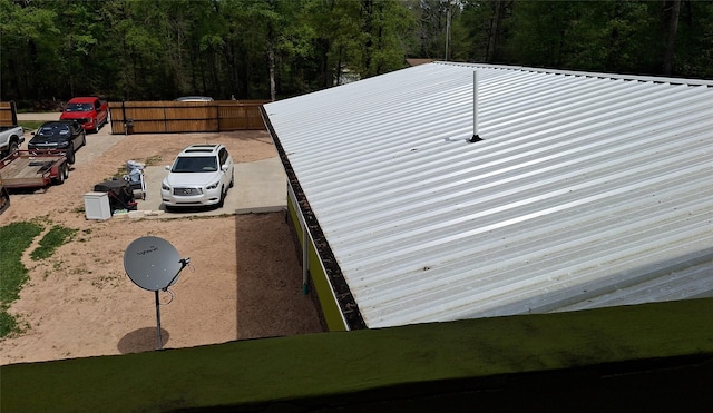 exterior space with a view of trees