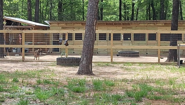 view of yard featuring a wooded view