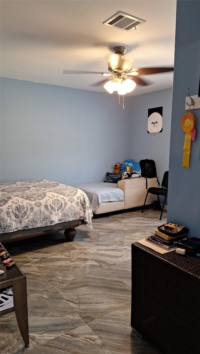 bedroom with visible vents and ceiling fan