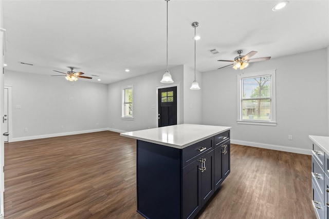 1603 Oleander Dr, La Marque, TX 77568 - kitchen featuring ceiling fan, light countertops, dark wood-style floors, and recessed lighting