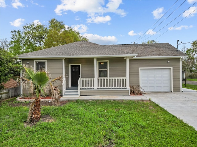 1603 Oleander Dr, La Marque, TX 77568 - view of front of property featuring a porch, concrete driveway, an attached garage, and roof with shingles