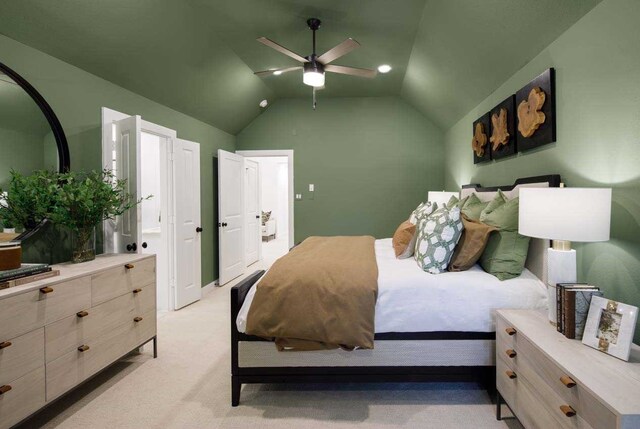 211 Cypress Pond Pl, Montgomery, TX 77316 - bedroom featuring ceiling fan, vaulted ceiling, and light colored carpet
