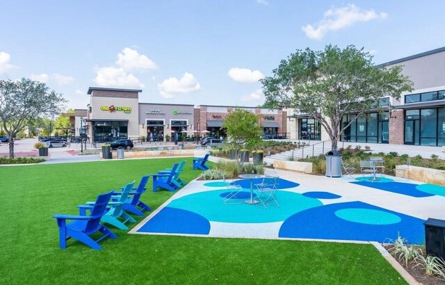 211 Cypress Pond Pl, Montgomery, TX 77316 - view of home's community with a lawn