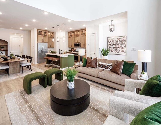 211 Cypress Pond Pl, Montgomery, TX 77316 - living room featuring light wood-type flooring and recessed lighting
