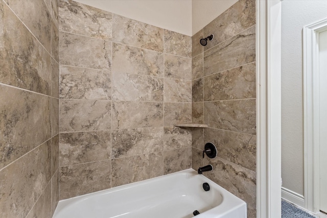 bathroom with shower / bath combination