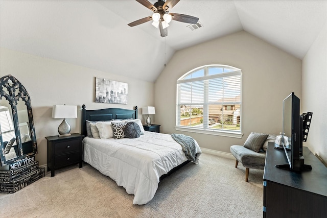 bedroom with vaulted ceiling, baseboards, visible vents, light colored carpet, and ceiling fan