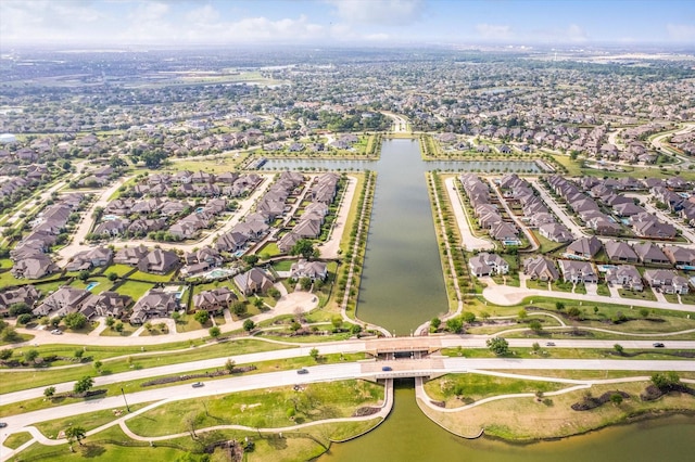 aerial view with a residential view and a water view
