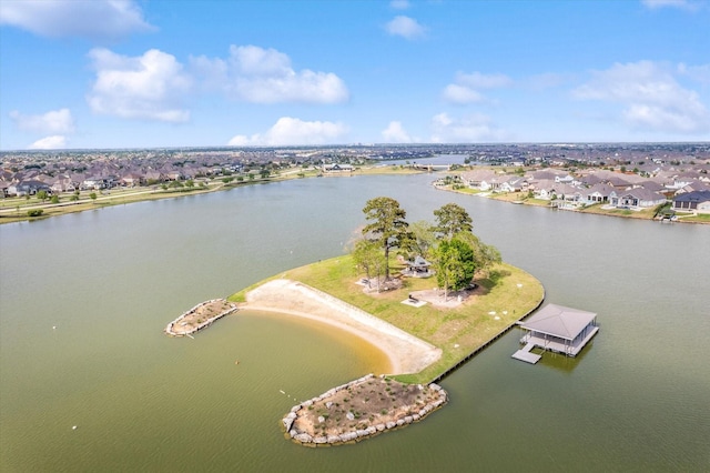 aerial view with a residential view and a water view