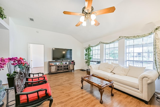 831 Woodfern Glen Ln, Pearland, TX 77584 - living room featuring vaulted ceiling, a ceiling fan, and light wood-type flooring