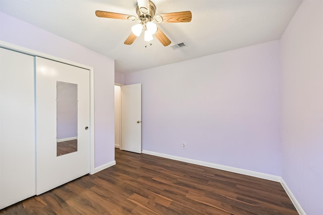 831 Woodfern Glen Ln, Pearland, TX 77584 - unfurnished bedroom with wood finished floors, baseboards, a closet, and ceiling fan
