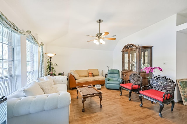 831 Woodfern Glen Ln, Pearland, TX 77584 - living room with lofted ceiling, ceiling fan, and light wood-type flooring