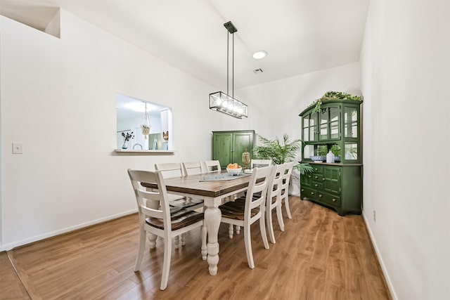 831 Woodfern Glen Ln, Pearland, TX 77584 - dining space with light wood finished floors and baseboards