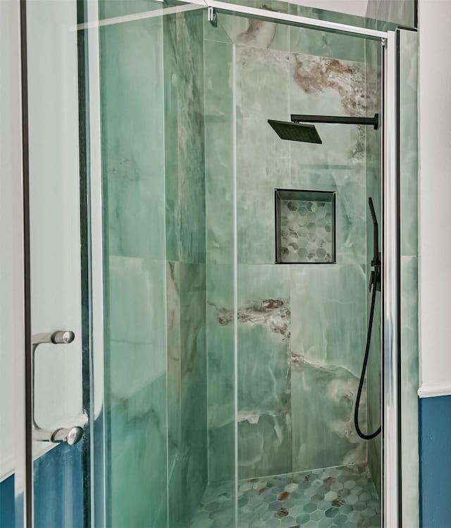 831 Woodfern Glen Ln, Pearland, TX 77584 - bathroom with a marble finish shower