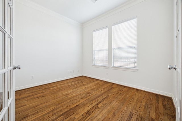 5309 Elm St, Houston, TX 77081 - empty room featuring baseboards, ornamental molding, and wood finished floors