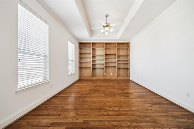 5309 Elm St, Houston, TX 77081 - interior space featuring baseboards, dark wood-style flooring, ornamental molding, and a raised ceiling